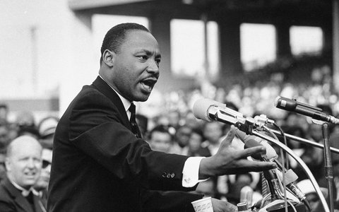 A black-and-white photo of Martin Luther King Jr.