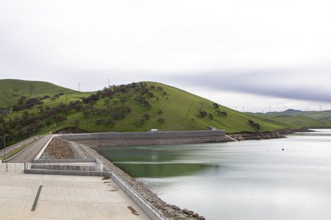 Water reservoir and green hills