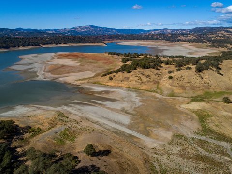 Lake Mendocino with large dry areas due to low water levels