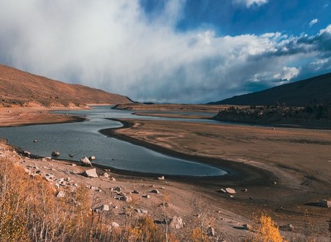 Lake with large dry areas