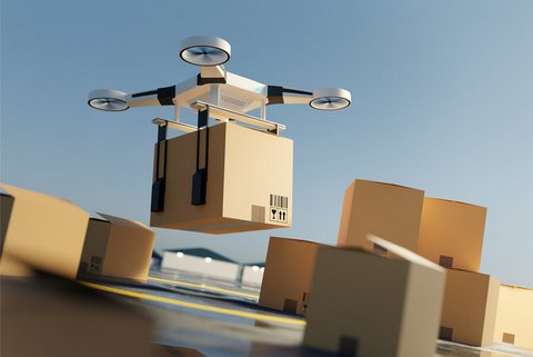 Drone holding box airborne with other boxes on ground
