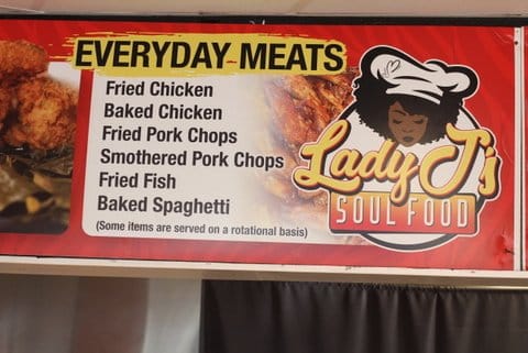 Everyday meats. Fried chicken. Baked chicken. Fried pork chops. Smothered pork chops. Fried fish. Baked spaghetti. (Some items are served on a rotational basis). Lady J's Soul Food. (Logo has drawing a of a Black woman's head with an afro and a chef's hat.)