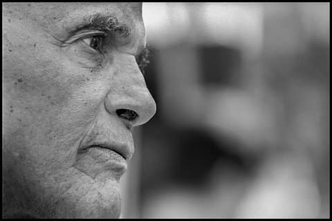 Black-and-white side view close-up of Harry Belafonte