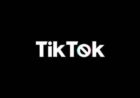 The word "Tik Tok" in white letters on a black background with the letter o replaced by a no symbol.