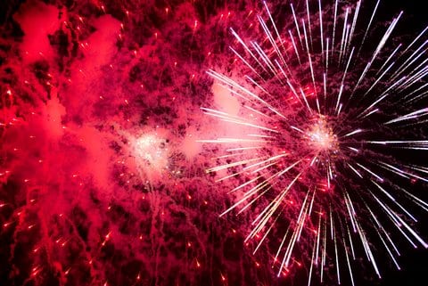 firework with red smoke